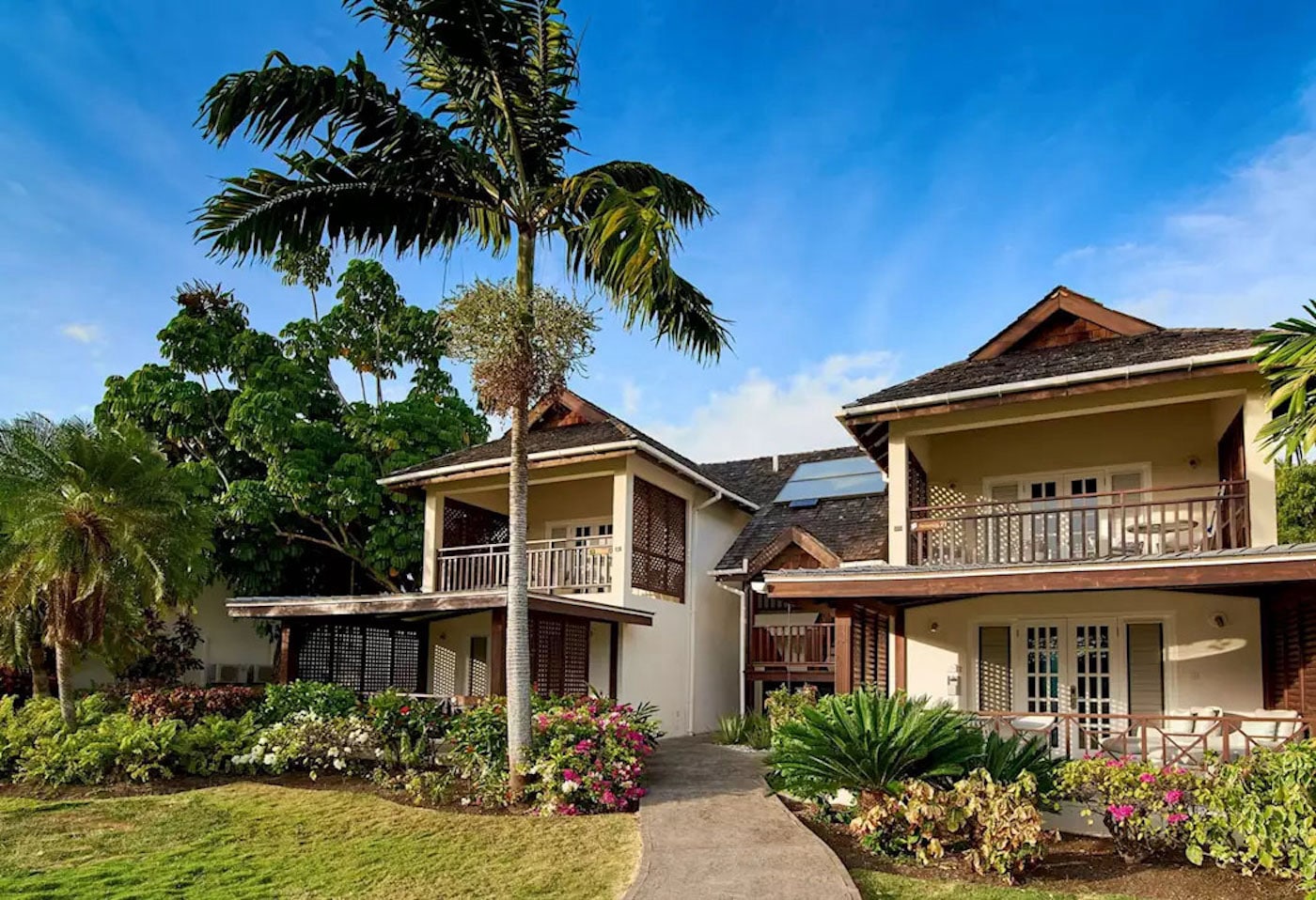 Calabash Grenada close-up view of suite exterior featuring a back porch and balcony.